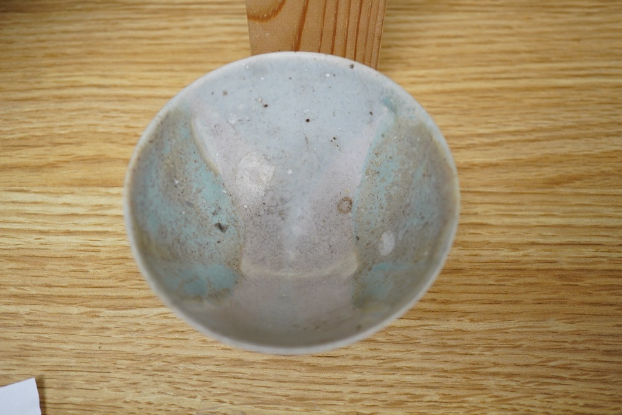 Mary White (1926-2013), a thinly-potted bowl with turquoise and pink glaze effects, monogrammed, 9cm diameter